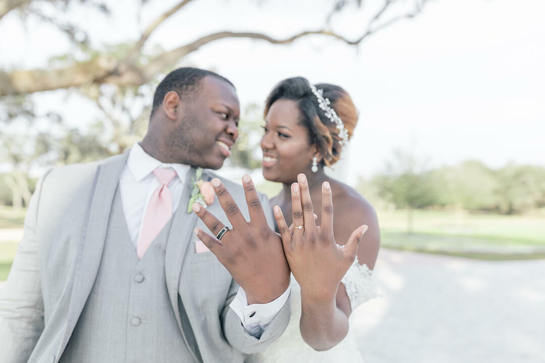 Wedding timeline and to-do list | Newlyweds show off their wedding rings